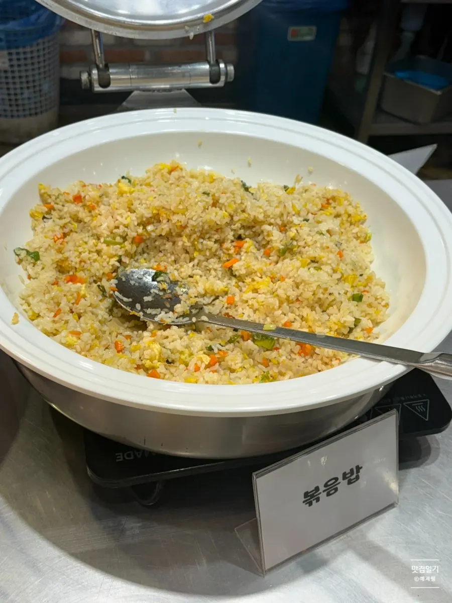 Side dishes and cooked dishes laid out at the buffet corner