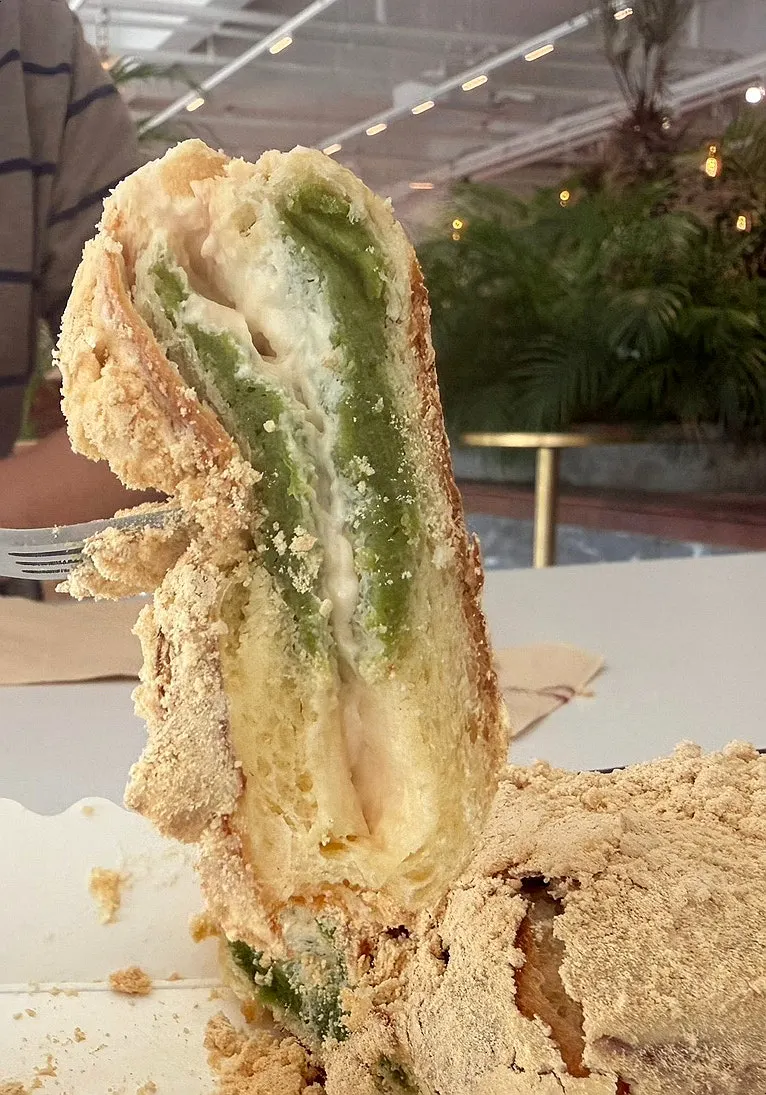 Doasis green tea injeolmi bread dusted with rice cake powder