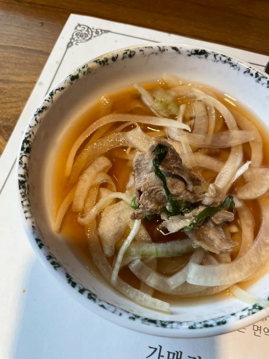 Thin duck bulgogi cooked to a mild finish