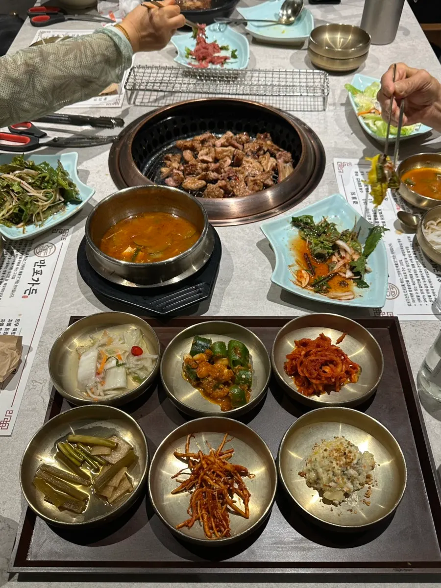 Hanwoo-style pork galbi grilling over charcoal