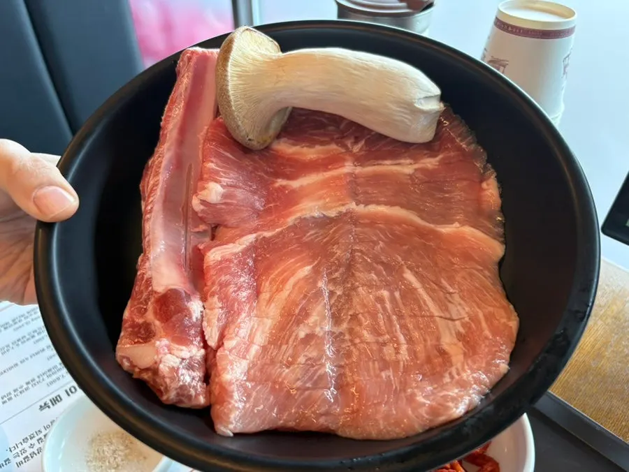 Manpo Galbi meat on the charcoal grill