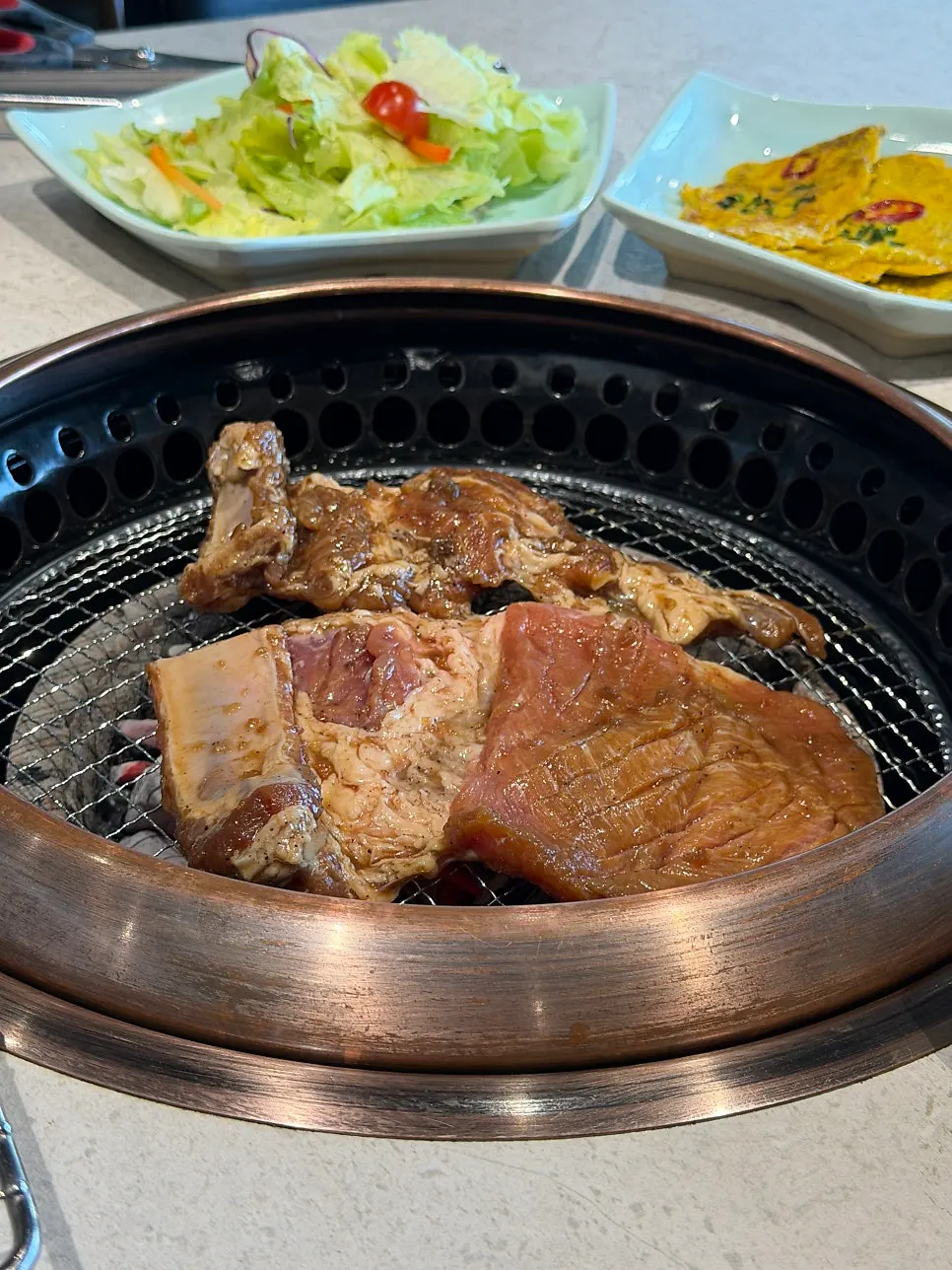Raw handmade marinated galbi set out at Manpo Garden
