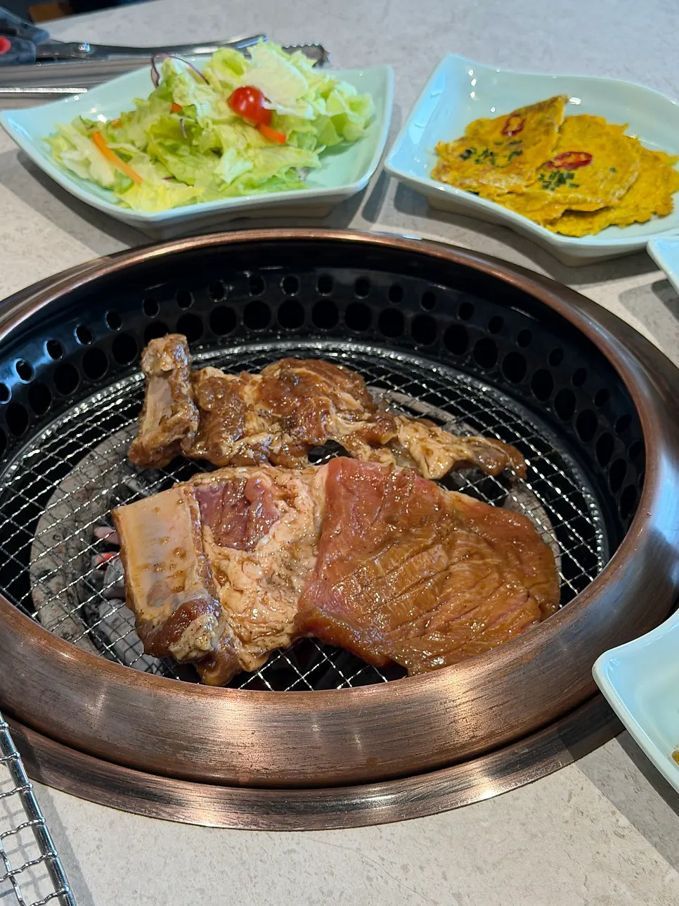 Manpo Garden's marinated galbi on the charcoal grill