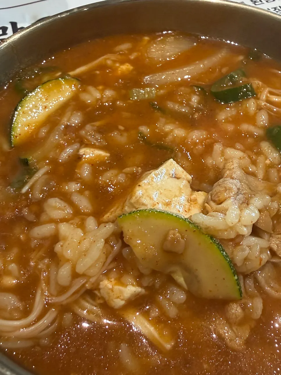 A spoonful of the brisket dwenjang sulbap
