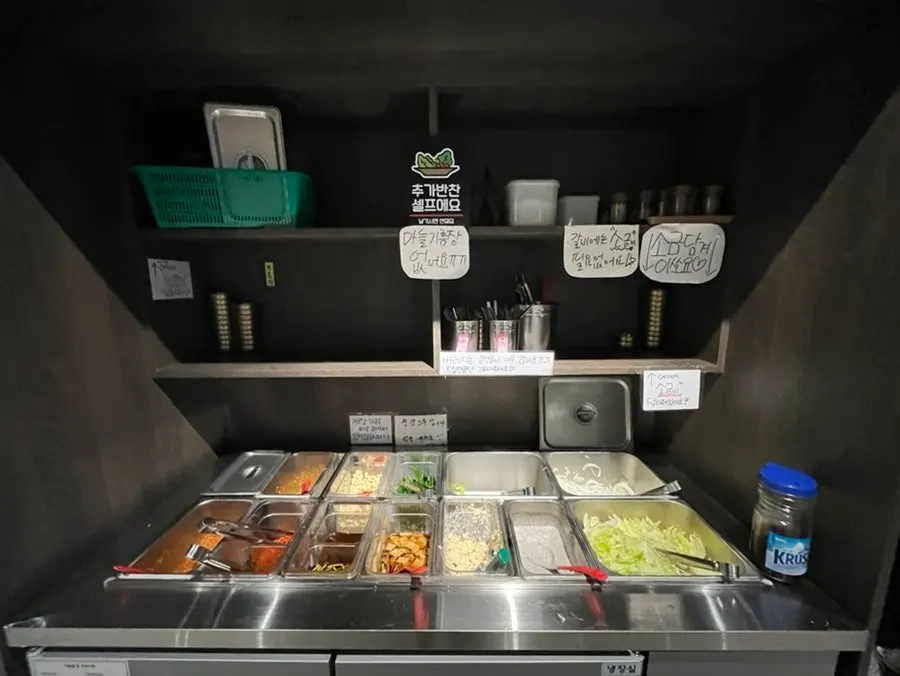Self-serve bar at Manpo Garden for refilling side dishes