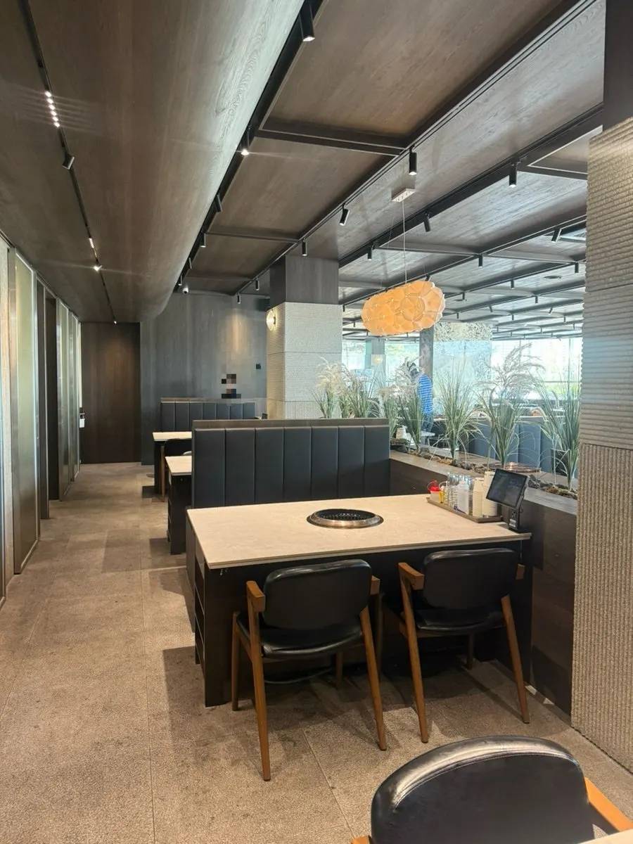 Spacious hall seating inside Manpo Garden