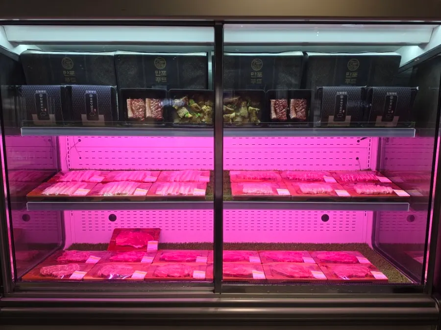 Meat showcase at the entrance of Manpo Garden