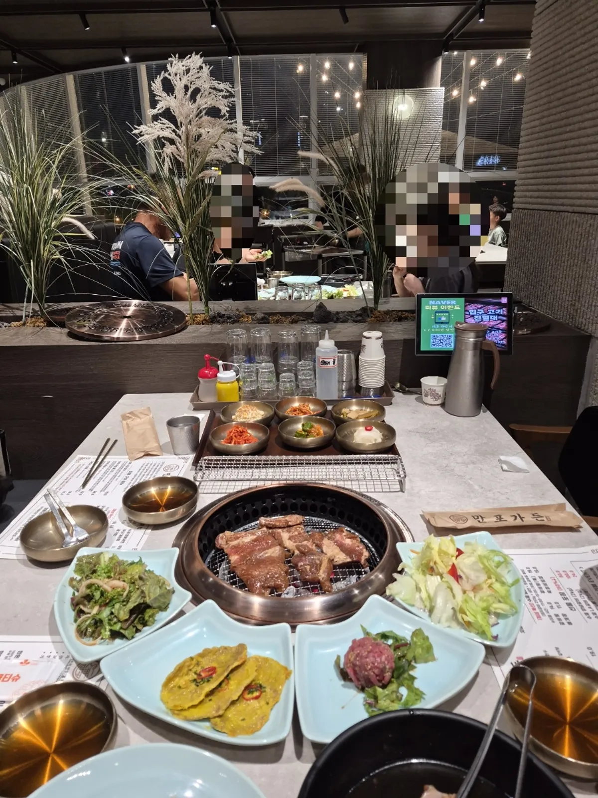 A full spread of handmade Korean pork galbi at Manpo Garden