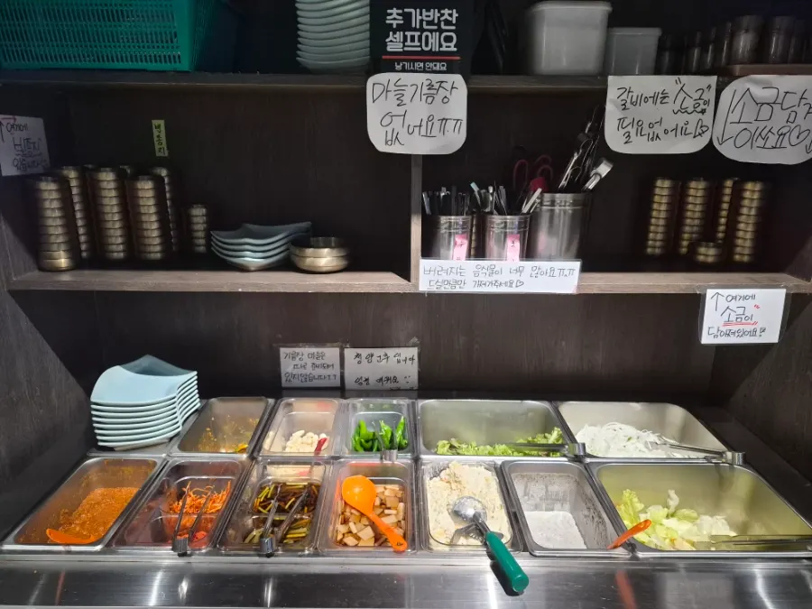 Salad and dressed lettuce served as sides