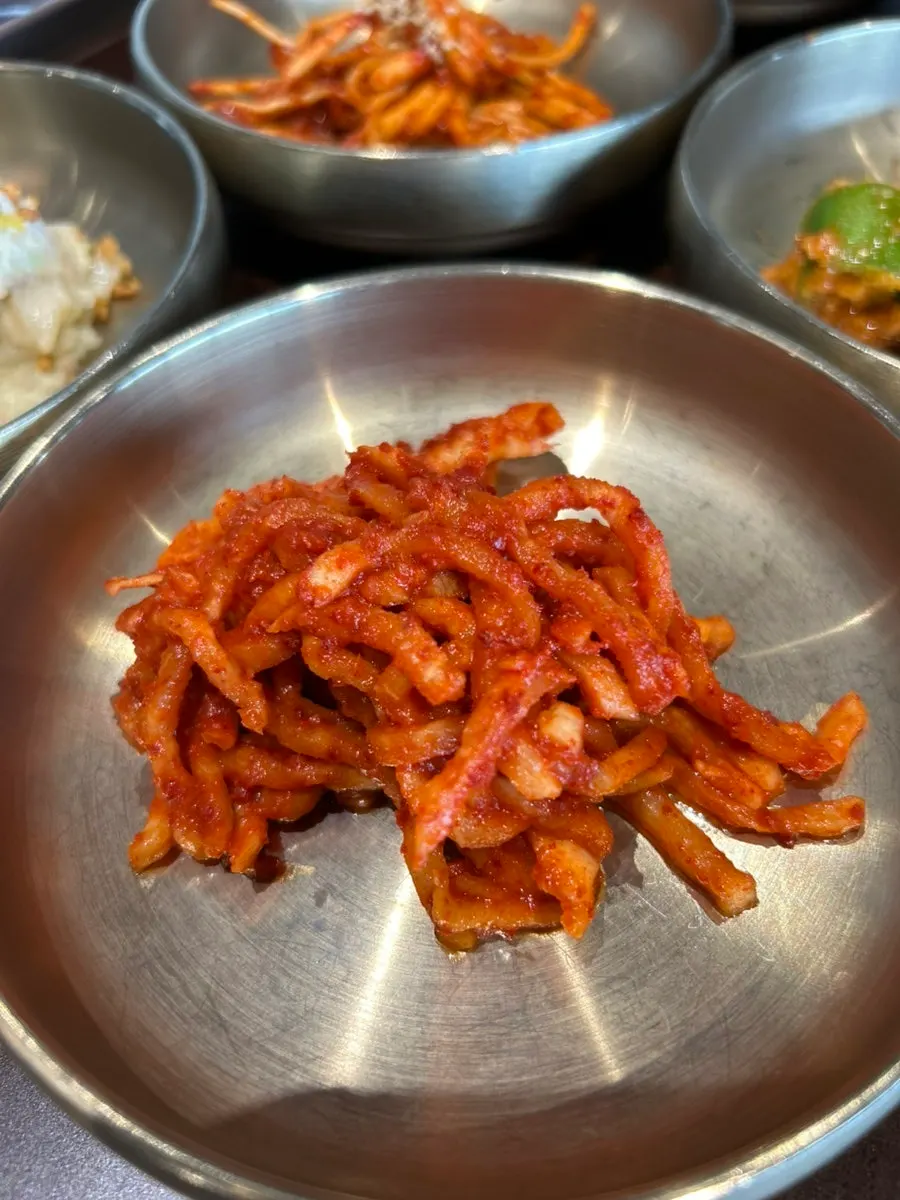 Full table of basic side dishes at Manpo Garden