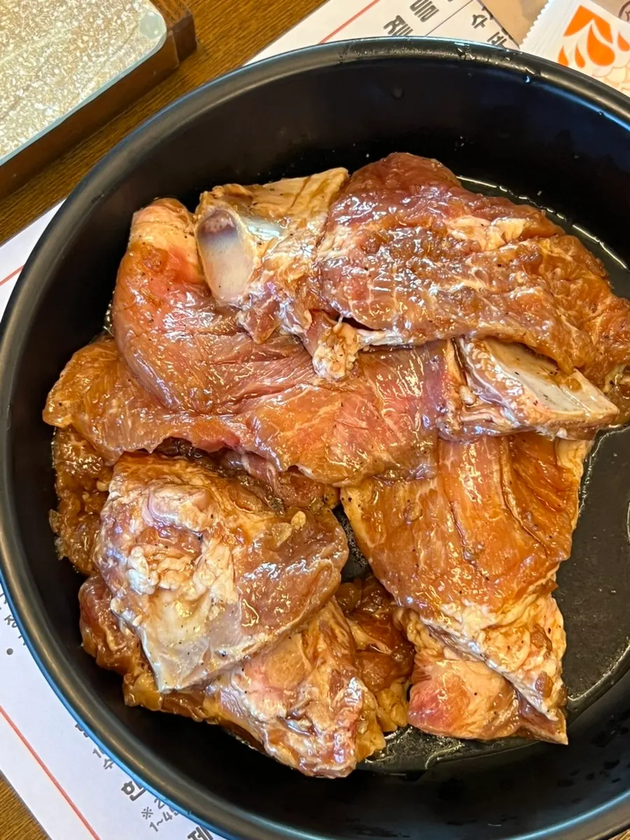 Menu listing for handmade Korean pork galbi