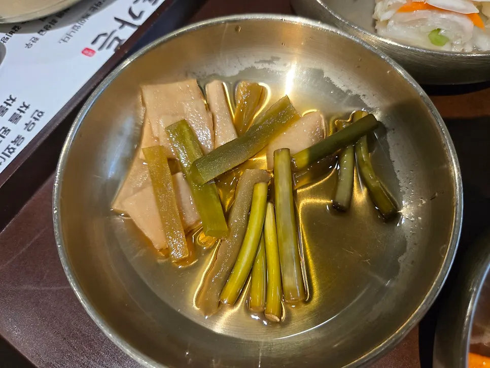 About six side dishes on the table