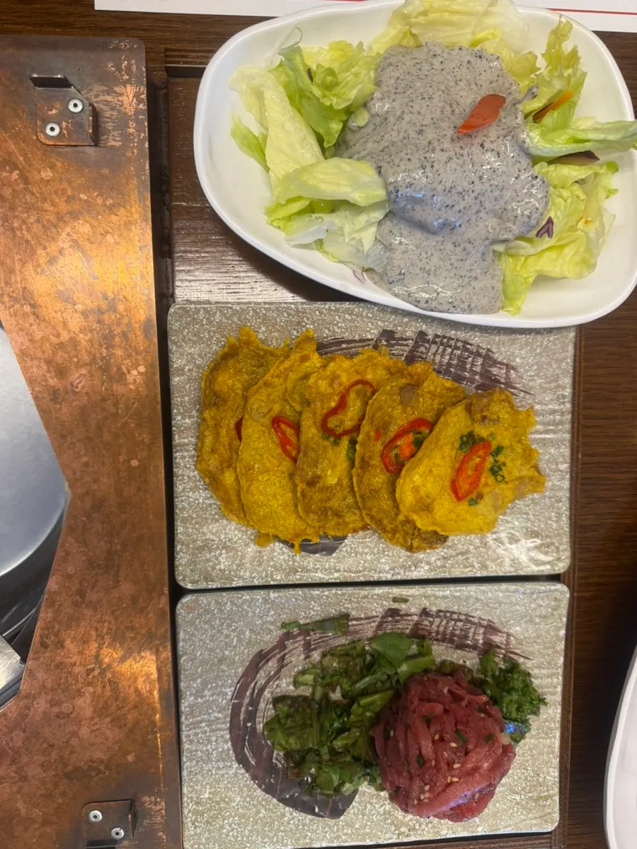 Yukhoe and yukjeon served as side dishes