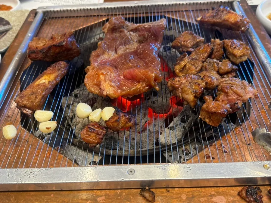 Charcoal seasoned galbi wrapped in a lettuce ssam