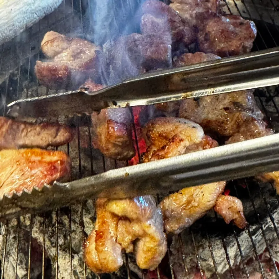 Mushrooms grilled alongside the raw galbi