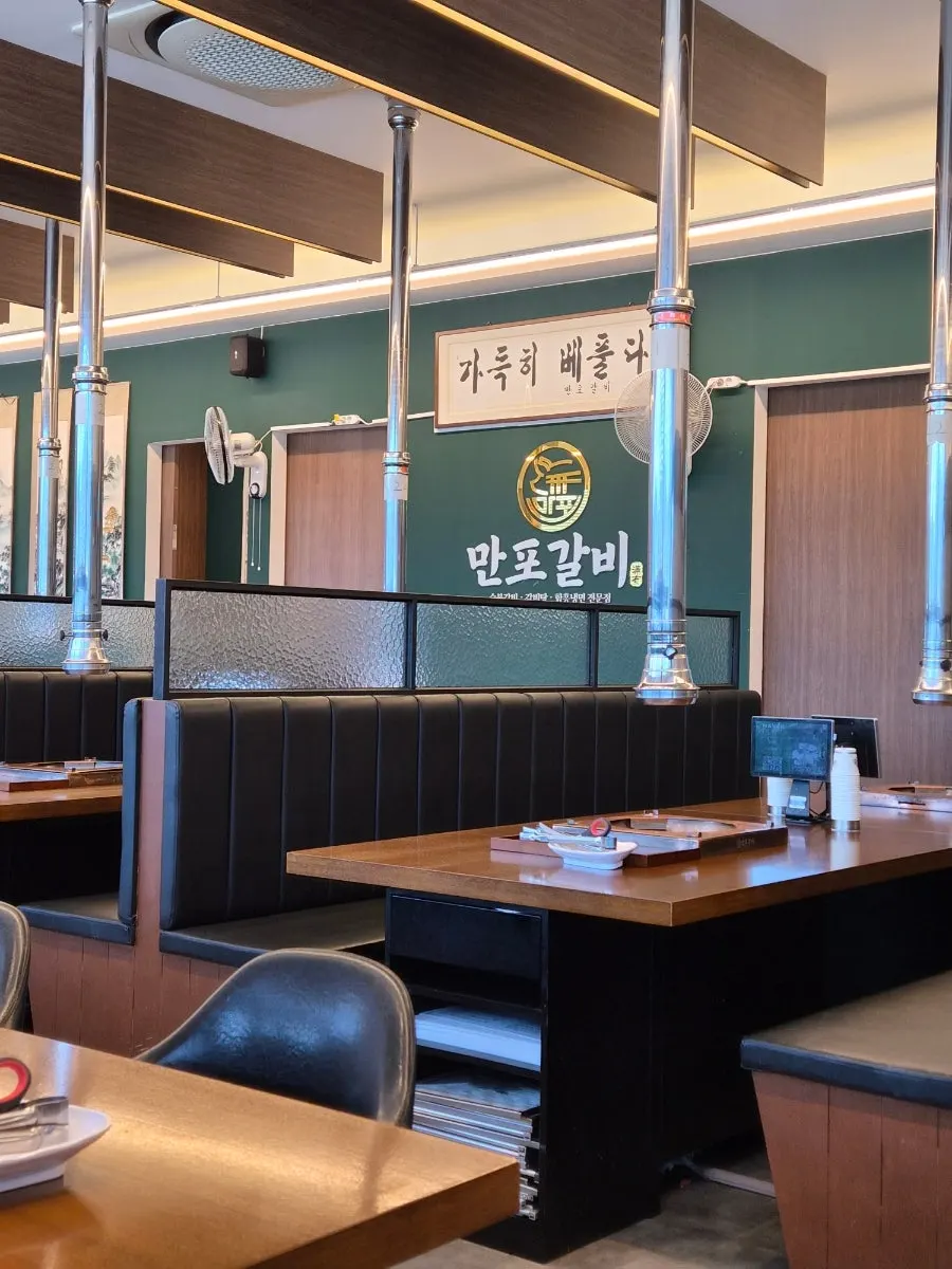 Interior tables and seating at Manpo Galbi