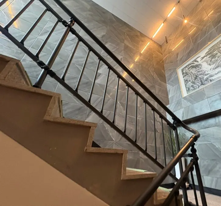 Stairway to the 2nd floor with artwork