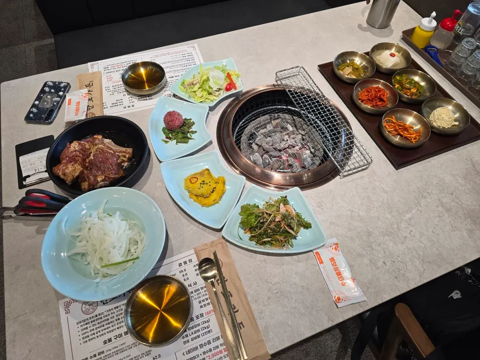 Manpo Garden table spread with side dishes