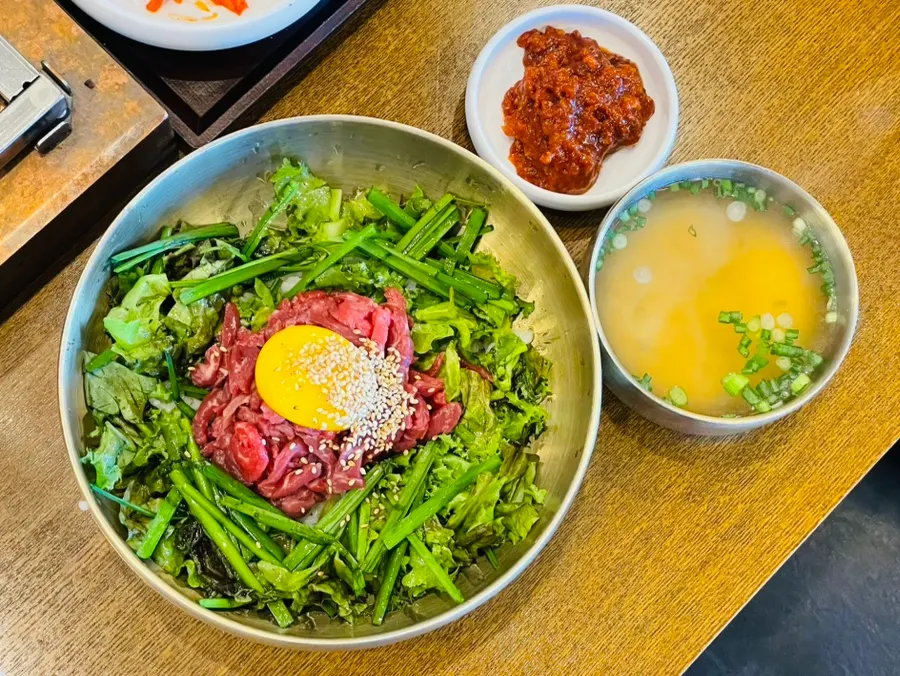 Yukhoe bibimbap loaded with raw beef