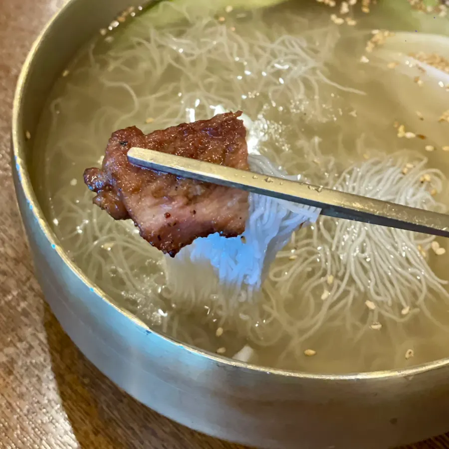 Mul-naengmyeon topped with pork rib