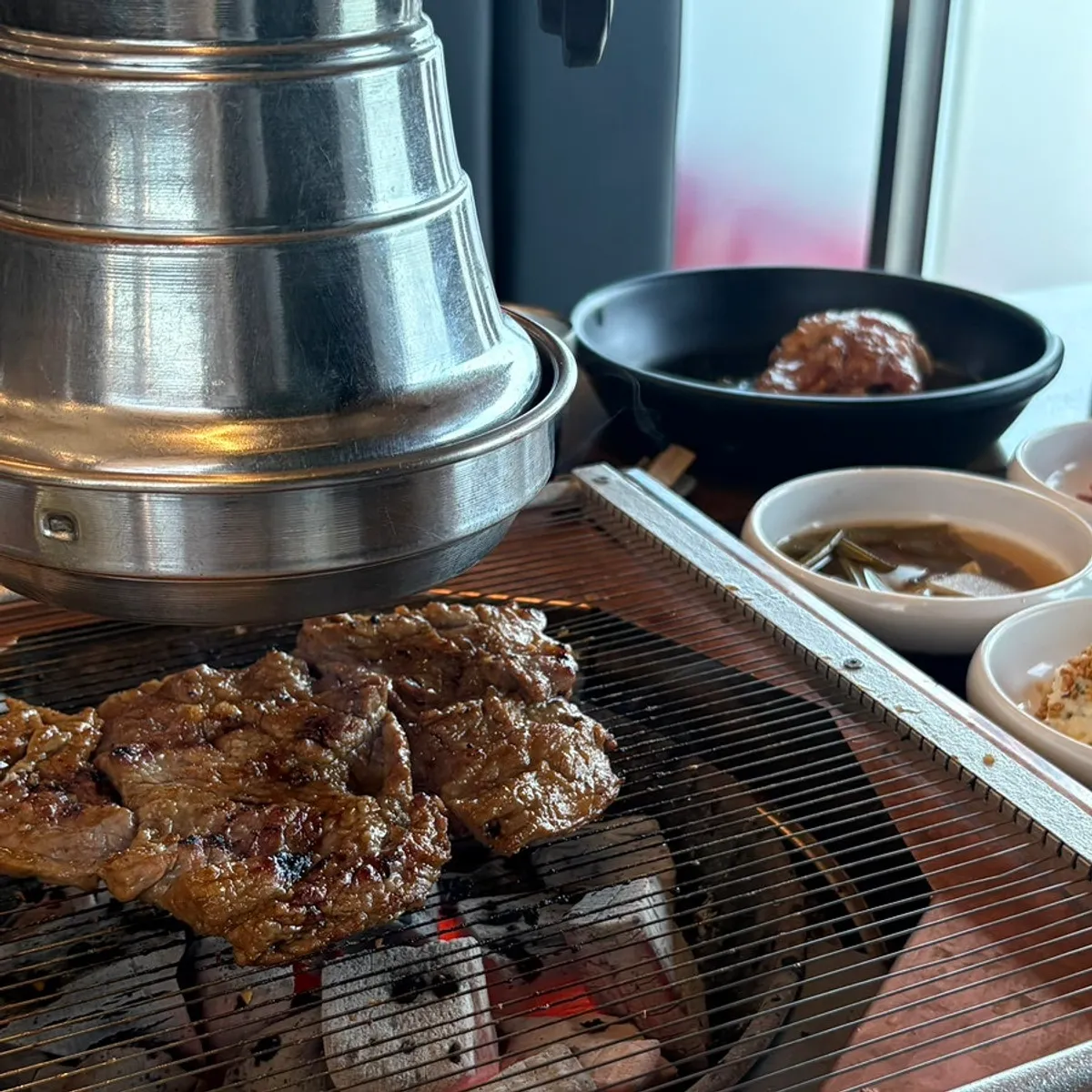 Thick seasoned galbi on the grill