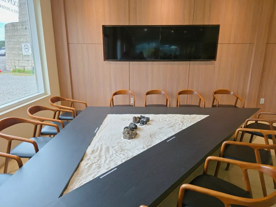 Moonbird hall with high ceilings and large tables