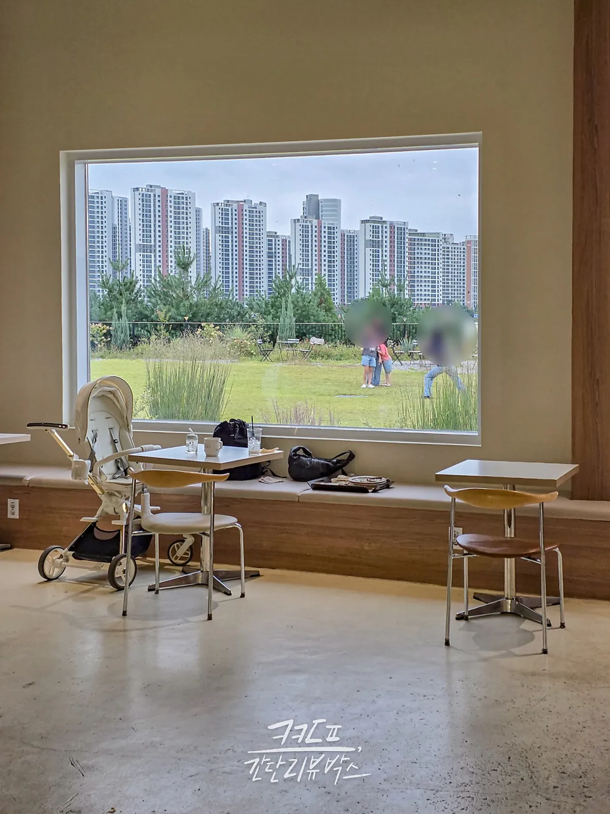 The view through the wide windows facing Moonbird's lawn