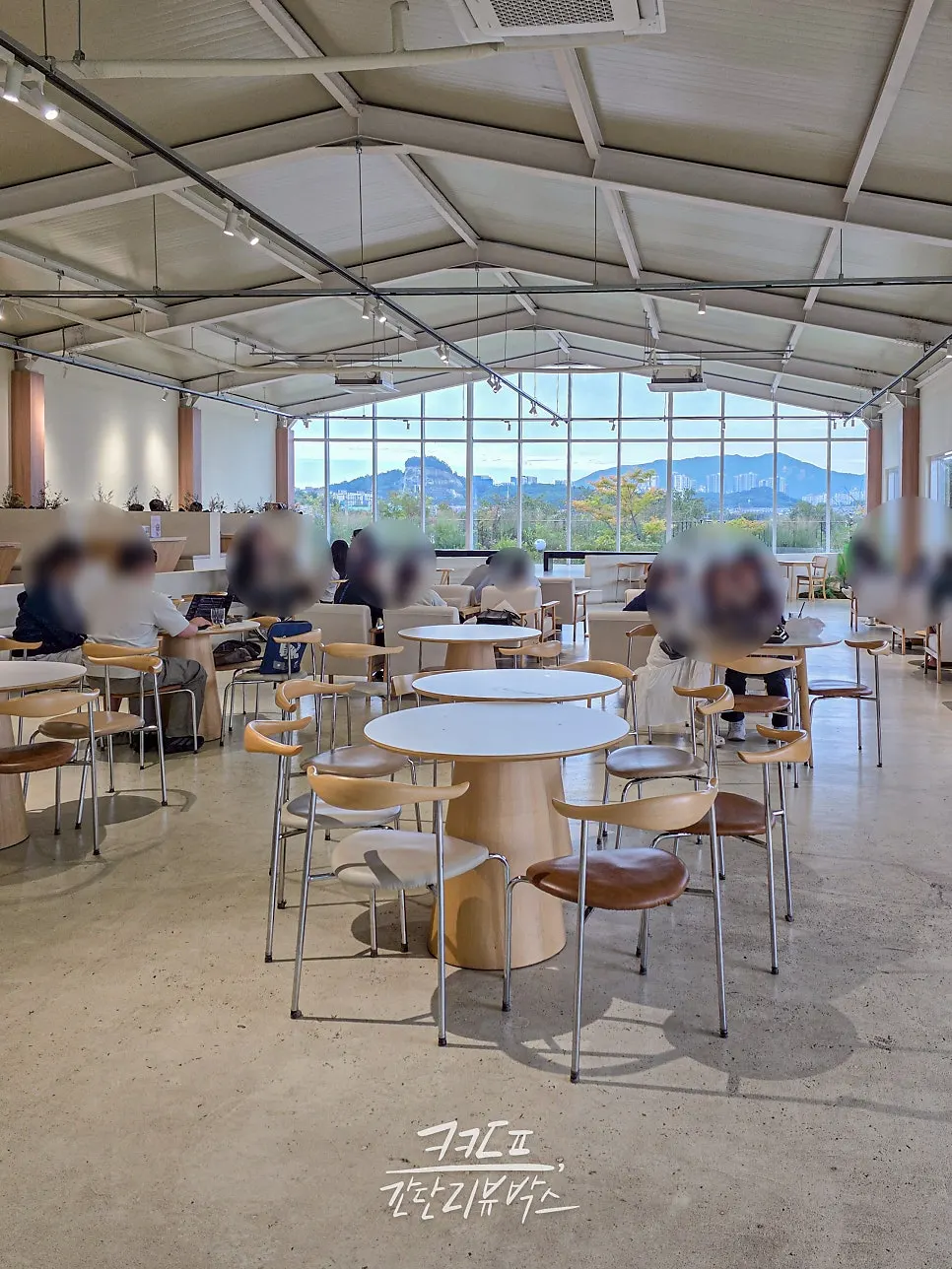 The floor-to-ceiling window seating in Moonbird's no-kids zone
