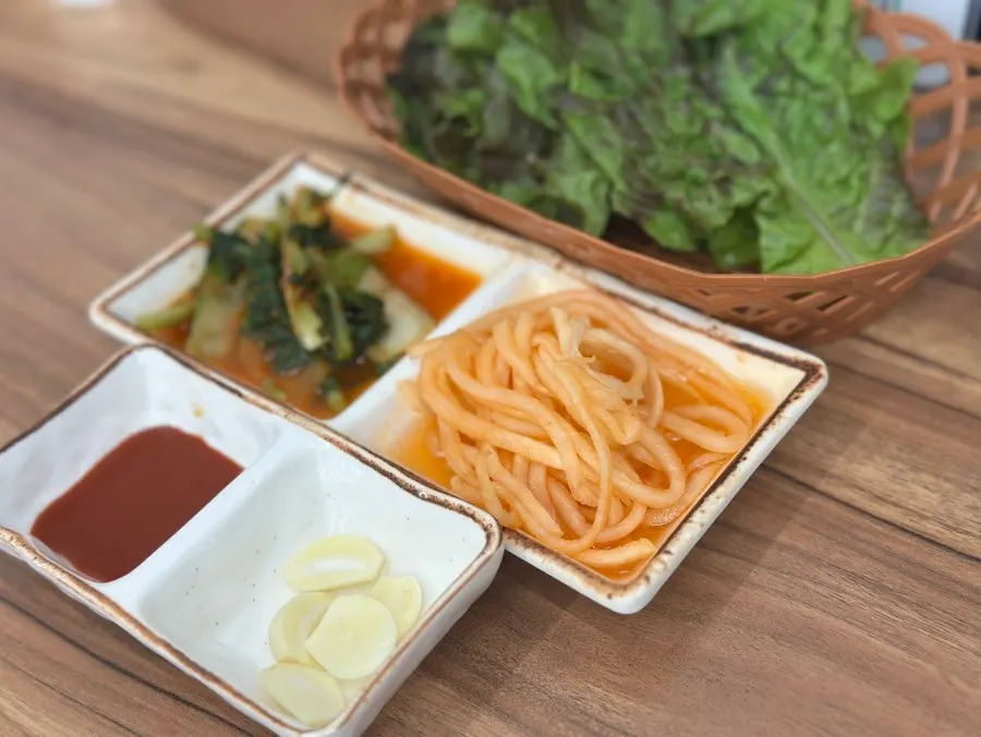 A plate of raw charcoal dakgalbi for two