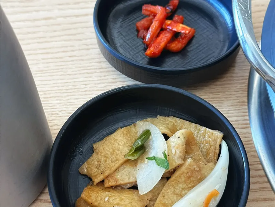 Plates of stir-fried fish cake and dried radish salad