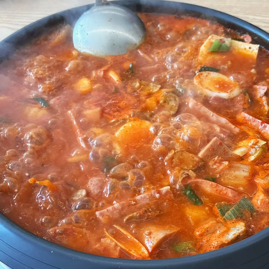 A piece of tofu soaked in broth