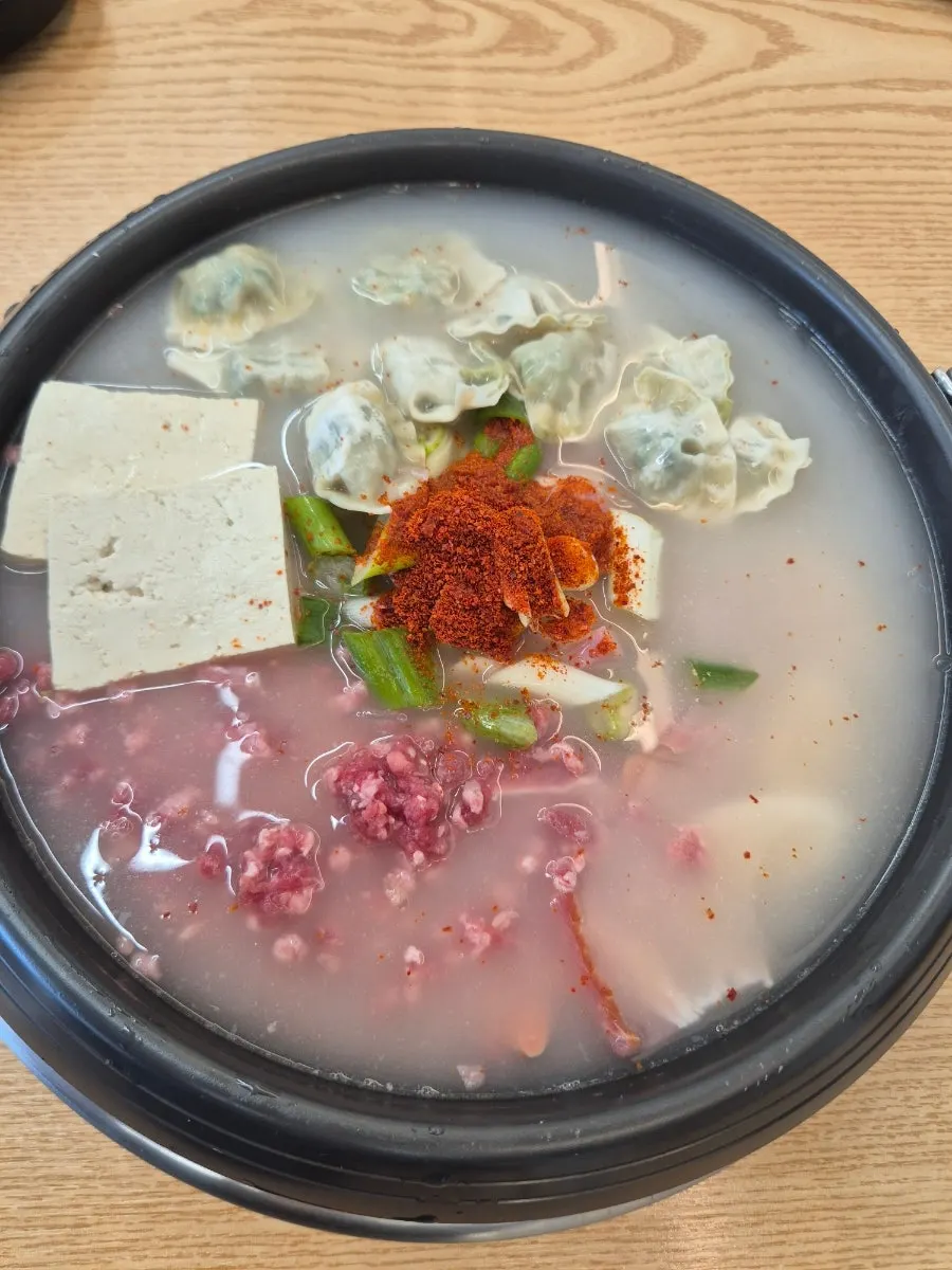 Rolled omelet and budae-jjigae table setting