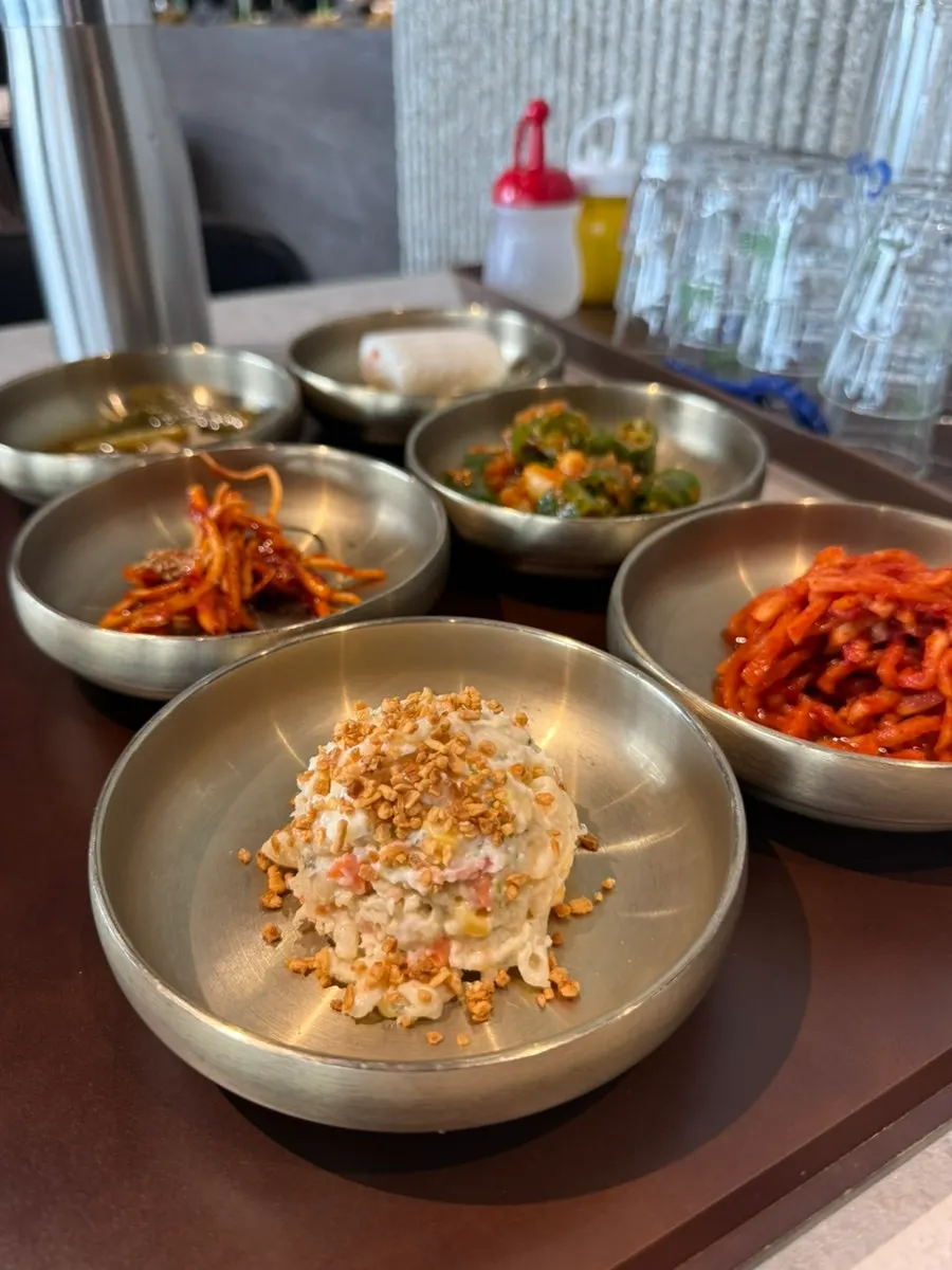 A tidy spread of banchan on the table
