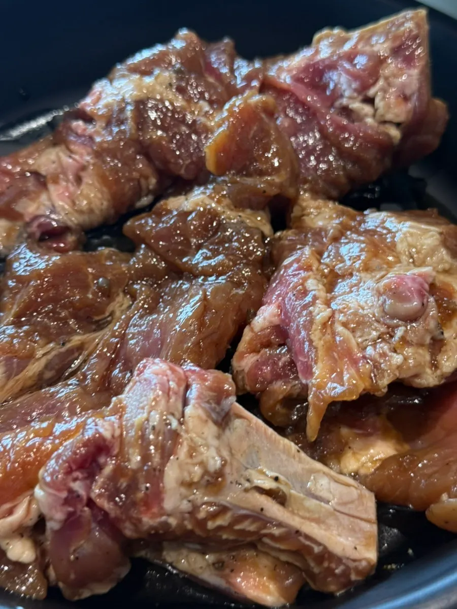Marinated galbi grilling over charcoal