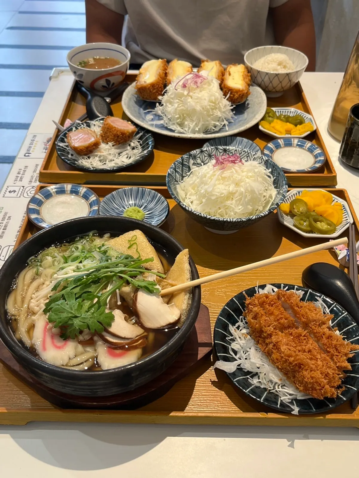 Finished tonkatsu sauce with a small ladle