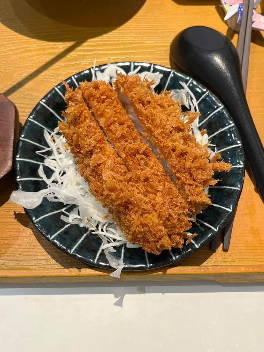 Close-up of the skewer udon ingredients, including konjac