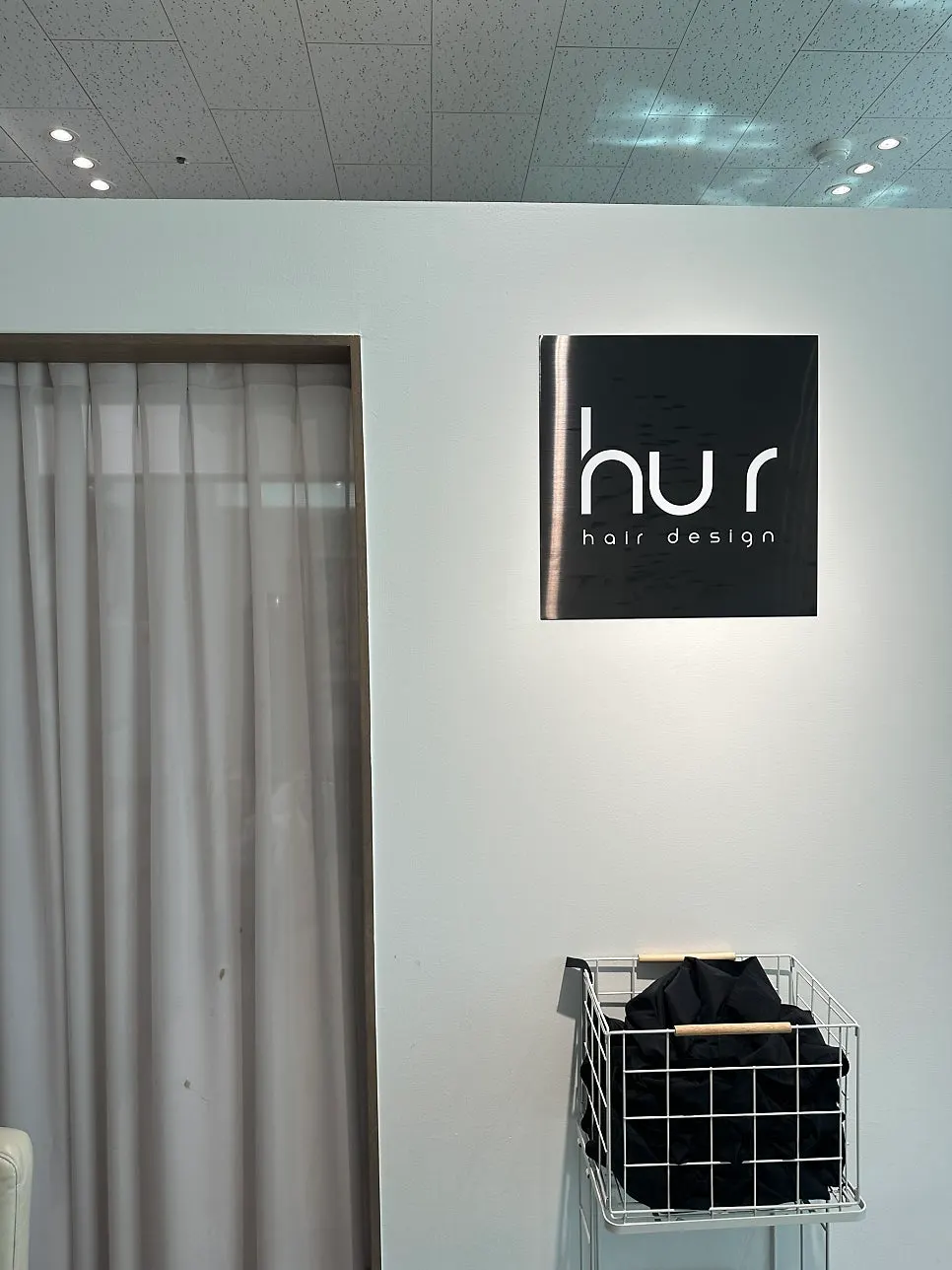 Whur's entrance visible as you step off the elevator