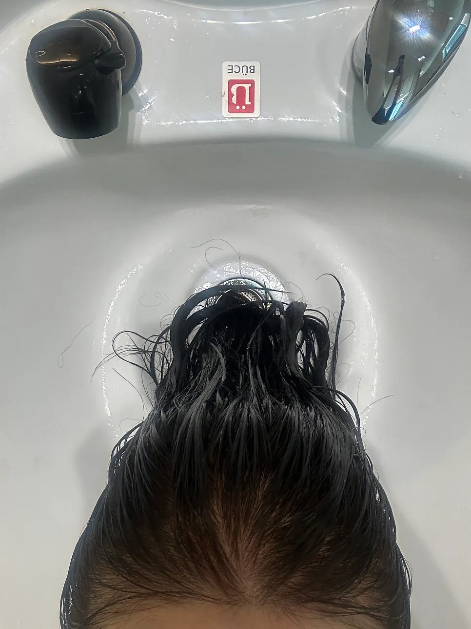 Receiving the 3-step clinic treatment in the wash room