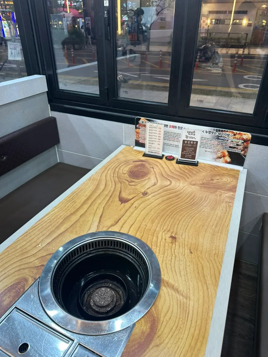 Spacious dining hall with wood-toned interior