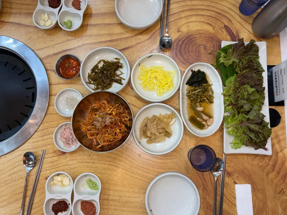 Meat table setting with side dishes
