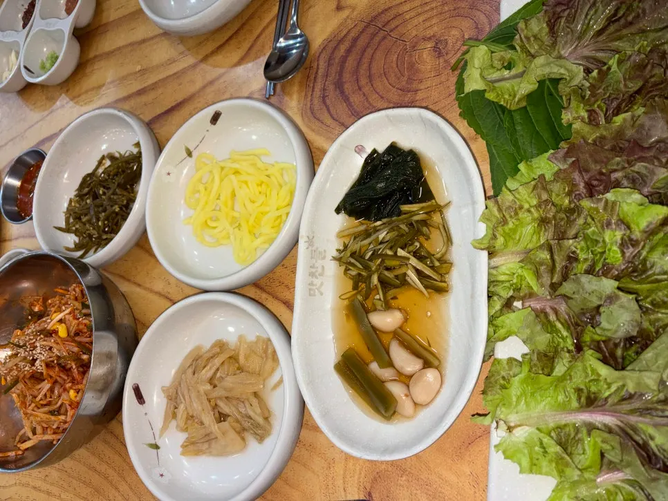 Side dishes including wild garlic and pickled vegetables