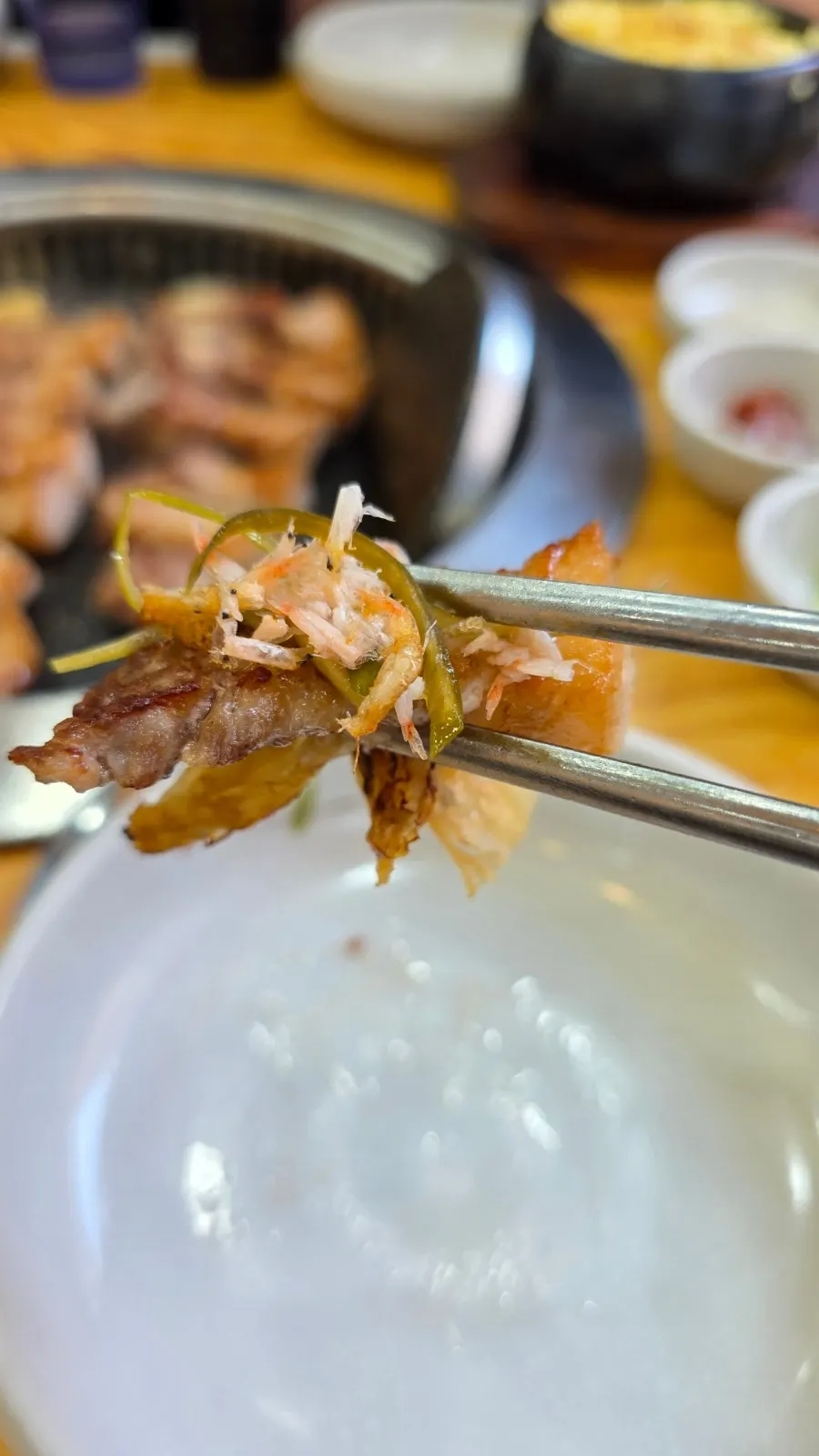 Pork belly grilled by staff