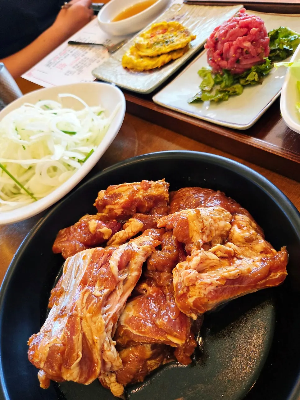 Handmade seasoned pork galbi before hitting the grill
