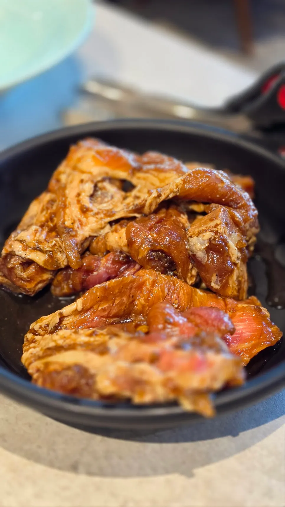 Seasoned galbi sizzling on the grill
