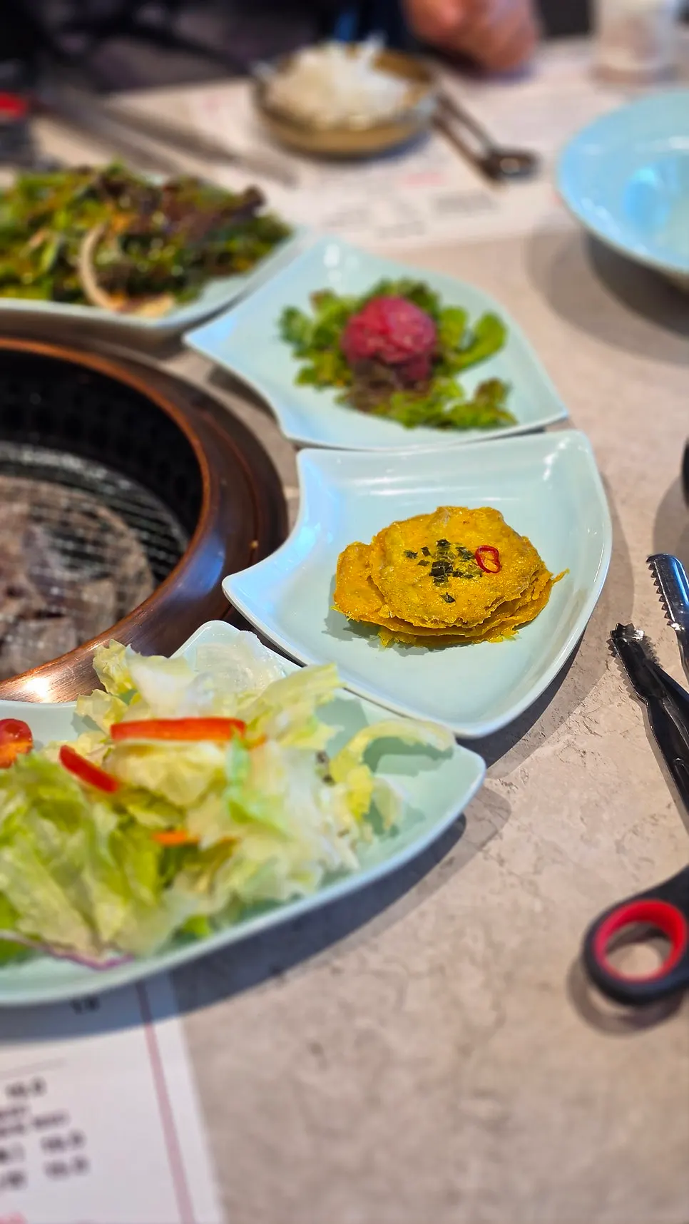 Colorful bowls of side dishes