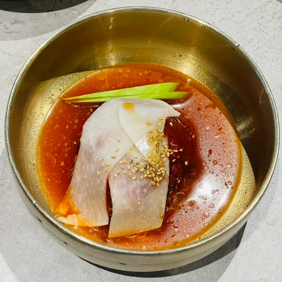 Handmade Hamhung naengmyeon in cold broth