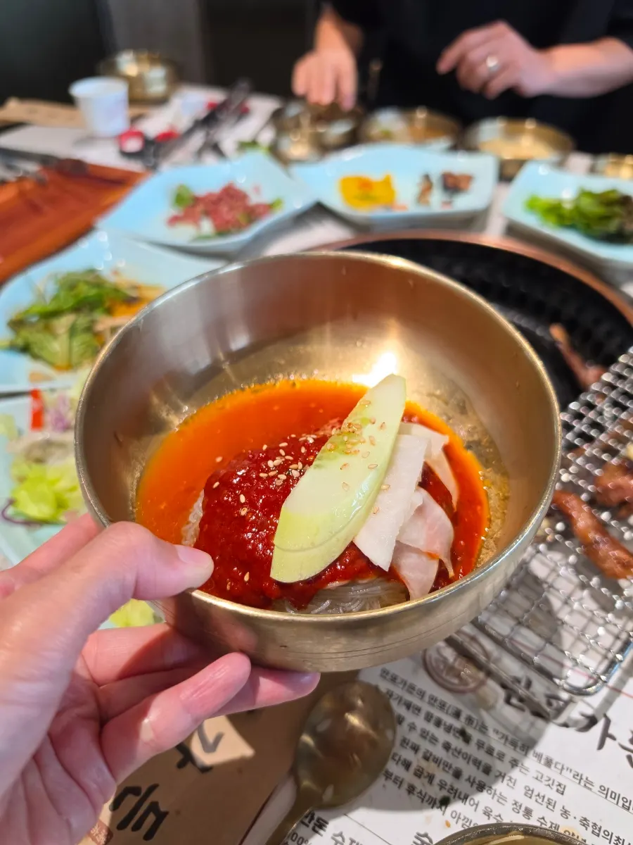 Galbi eaten with pickled onions