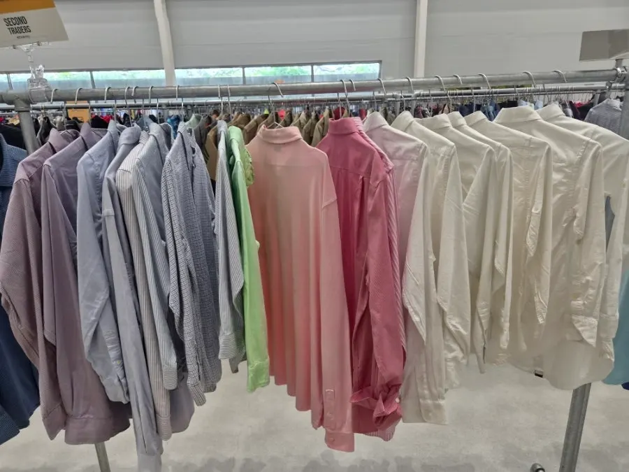 Secondhand clothing organized by color and design