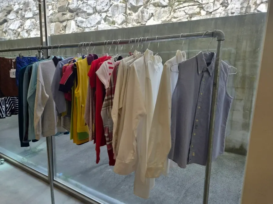 Rack of kids' jerseys and tops