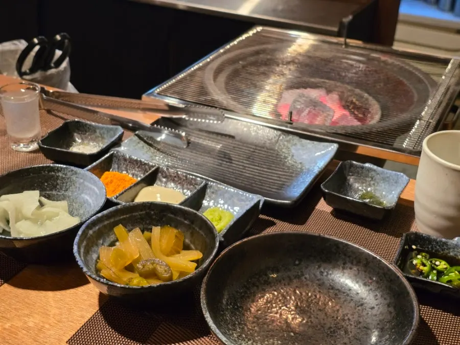 Plate of sauces including salt and wasabi